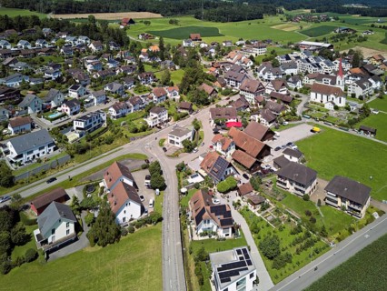 View of the village with the Roman Catholic parish church of St Anna, behind the Lindenberg,