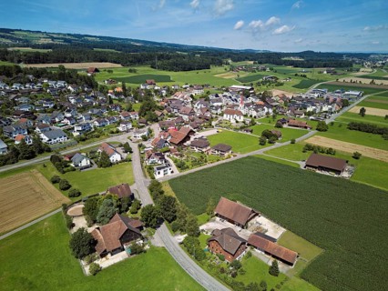 View of the village with the Roman Catholic parish church of St Anna, behind the Lindenberg,