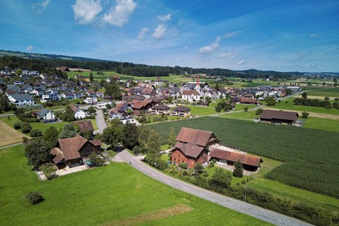 View of the village with the Roman Catholic parish church of St Anna, behind the Lindenberg,