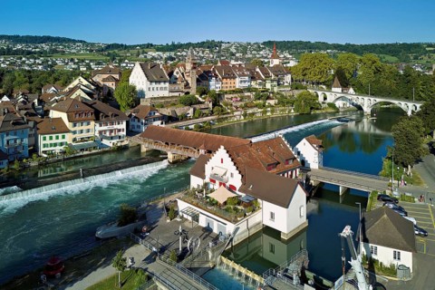 Old town with the tower of the Muri- Amthof, in the foreground the weir and the museum