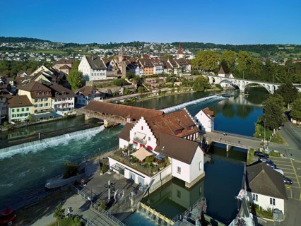 Old town with the tower of the Muri- Amthof, in the foreground the weir and the museum