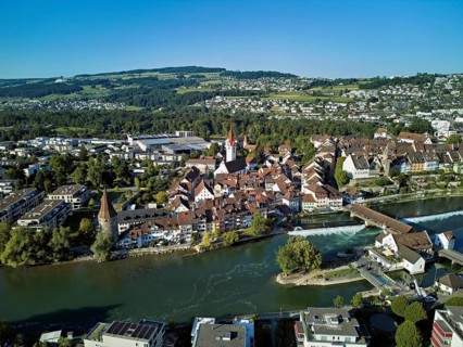 Old town with the Catholic Church of St Nicholas and the Witches' Tower, in the foreground the