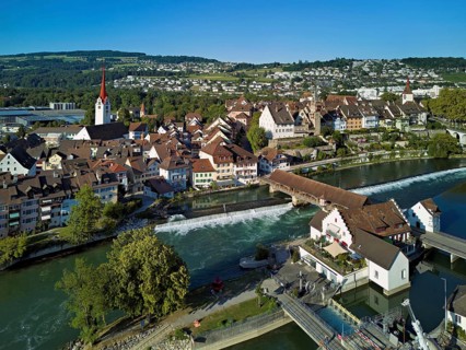 Old town with the Catholic Church of St Nicholas and the tower of the Muri- Amthof, in the