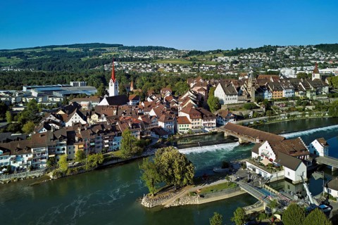 Old town with the Catholic Church of St Nicholas and the tower of the Muri- Amthof, in the
