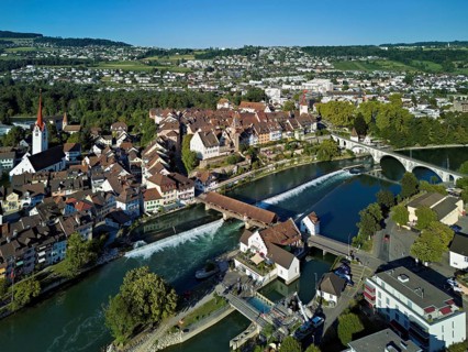 Old town with the Catholic Church of St Nicholas and the tower of the Muri- Amthof, in the