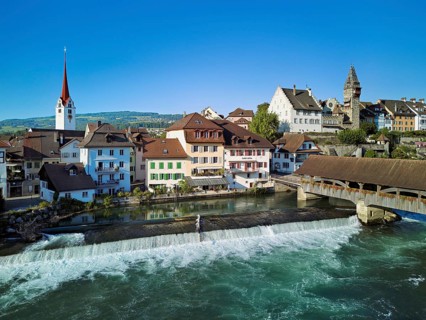 Old town with the Catholic Church of St Nicholas and the tower of the Muri- Amthof, in the