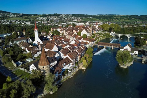 Old town with the Catholic Church of St. Nicholas, the tower of the Muri- Amthof and the witches'
