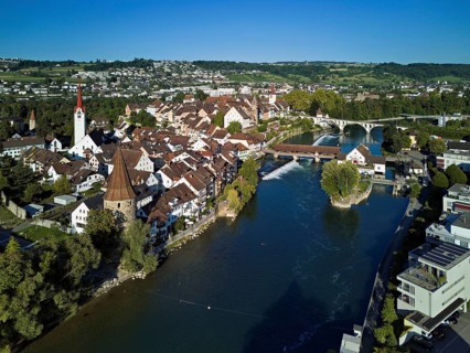 Old town with the Catholic Church of St. Nicholas, the tower of the Muri- Amthof and the witches'