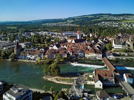 Old town with the Catholic church of St Nicholas and the witches' tower and the tower of the Muri-