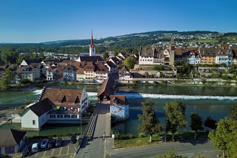 Old town with the Catholic Church of St Nicholas and the tower of the Muri- Amthof, in the