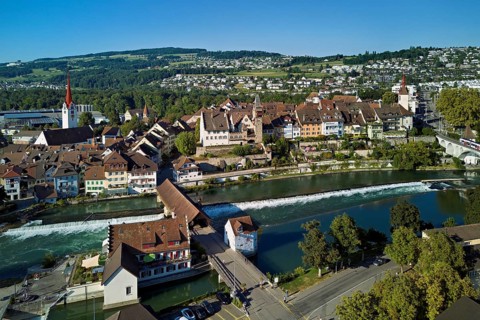 Old town with the Catholic Church of St Nicholas and the tower of the Muri- Amthof, in the