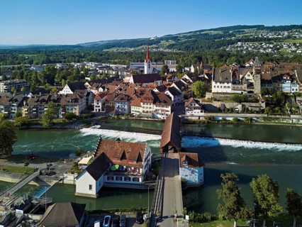 Old town with the Catholic Church of St Nicholas and the tower of the Muri- Amthof, in the