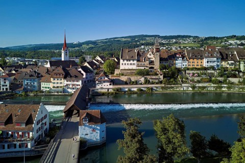 Old town with the Catholic Church of St Nicholas and the tower of the Muri- Amthof, in the