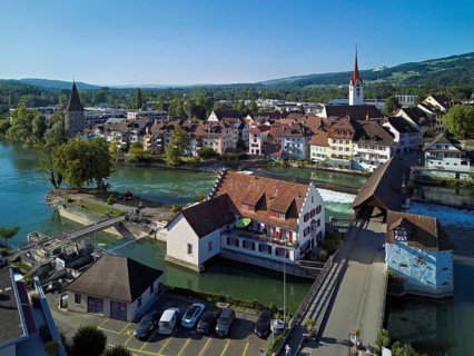 Old town with the Catholic Church of St Nicholas and the Witches' Tower, in the foreground the