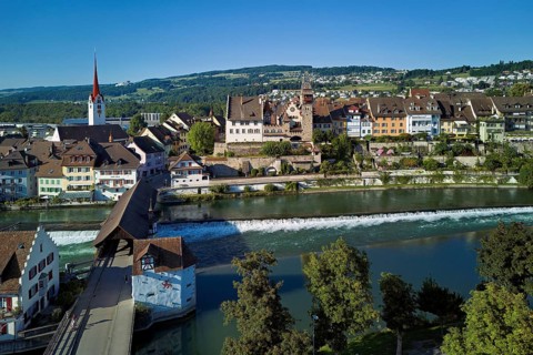 Old town with the Catholic Church of St Nicholas and the tower of the Muri- Amthof, in the