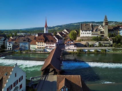 Old town with the Catholic Church of St Nicholas and the tower of the Muri- Amthof, in the
