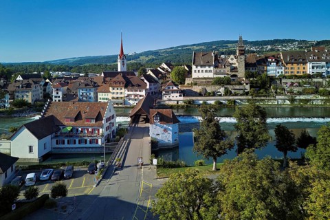 Old town with the Catholic Church of St Nicholas and the tower of the Muri- Amthof, in the
