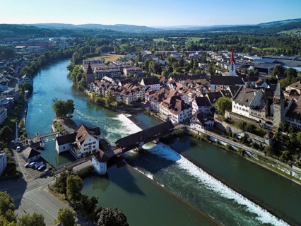 Old town with the Catholic Church of St Nicholas and the tower of the Muri- Amthof, in the