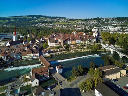 Old town with the Catholic Church of St Nicholas and the tower of the Muri- Amthof, in the