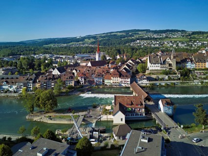 Old town with the Catholic Church of St Nicholas and the tower of the Muri- Amthof, in the