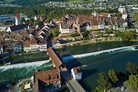 Old town with the Catholic Church of St Nicholas and the tower of the Muri- Amthof, in the