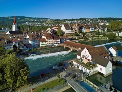 Old town with the Catholic Church of St Nicholas and the tower of the Muri- Amthof, in the