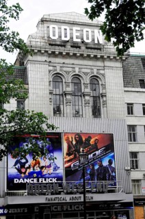 London, England, Great Britain, Europe, Odeon cinema with eye-catching advertising and posters,