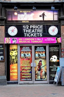 London, England, Great Britain, Europe, Colourful theatre facade in London with posters for current