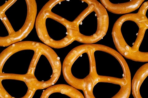 Closeup of some lye pretzels in dark back