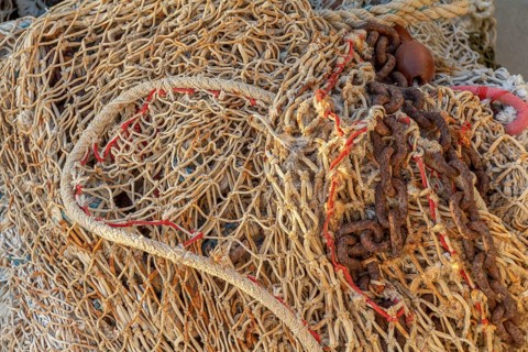 Full frame picture showing a tangled fishing net