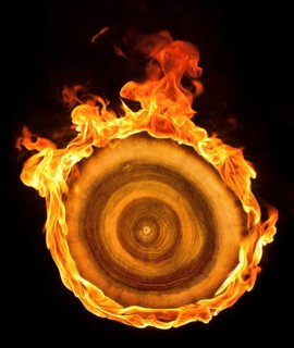 A burning wooden sheave in black back