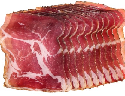 Closeup shot showing sliced raw ham pieces