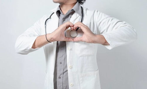 Doctor heart hand in stethoscope