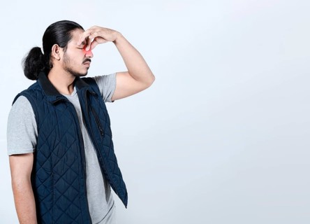 Sore man with sinus pain on isolated