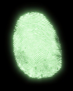 A green glowing fingerprint in black back