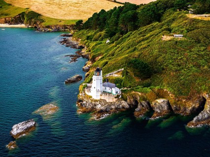 St Anthony Lighthouse from drone, Roseland peninsula, Head circular walk, Cornwall, UK