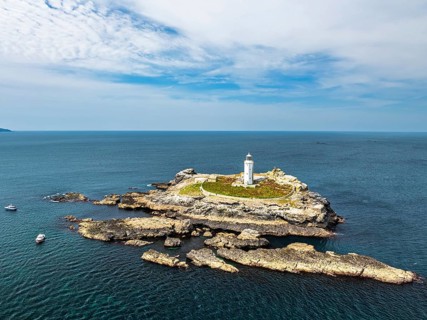Godrevy Lighthouse from a drone, Godrevy Island, St Ives Bay, Cornwall, England, United Kingdom