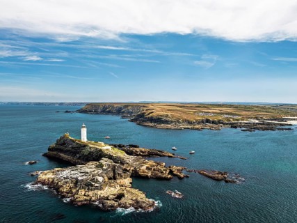 Godrevy Lighthouse from a drone, Godrevy Island, St Ives Bay, Cornwall, England, United Kingdom