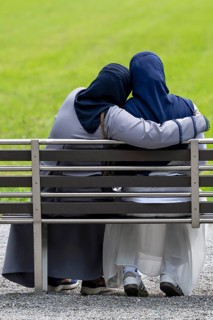 Bench woman couple, Interlaken, Switzerland