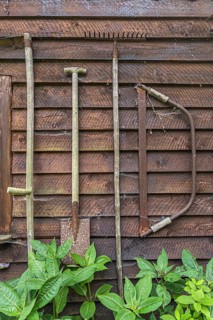 Tools for the garden on a wooden facade, equipment, work, Bissendorf, Lower Saxony, Germany
