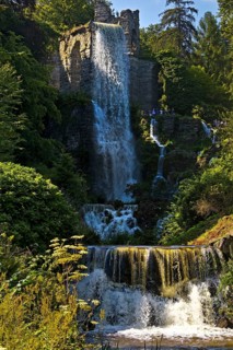 Water features at the equaduct with the highest artificial waterfall in a landscaped garden,