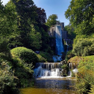 Water features at the equaduct with the highest artificial waterfall in a landscaped garden,