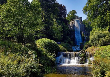 Water features at the equaduct with the highest artificial waterfall in a landscaped garden,