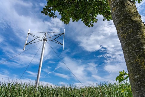 Vertical axis wind turbine, Darrieu wind turbine, 2 vertically mounted rotors rotate around the
