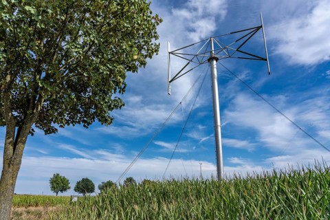 Vertical axis wind turbine, Darrieu wind turbine, 2 vertically mounted rotors rotate around the