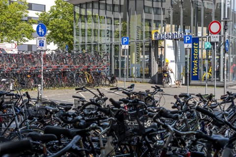 Cycling in Münster, large bicycle parking area in front of Münster main station, bicycle station,