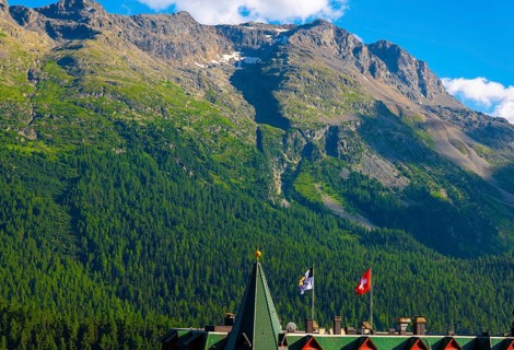 Beautiful Luxury Hotel with Swiss and Grisons and Flag Blue Sky and Mountain in the Swiss Alps in a