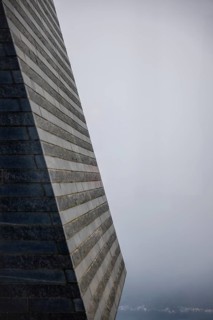 Modern Granite Wall in the Fog with Sunlight in Switzerland