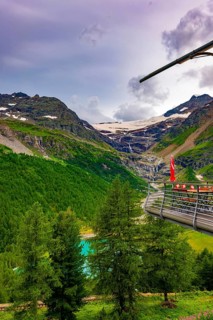 Terrace View over Beautiful Mountain Alp Grüm with Glacier and Alpine Lake Palü in the Swiss Alps