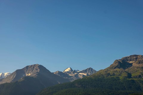 Beautiful Mountainscape with Glacier in the Swiss Alps and Blue Sky in a Sunny Summer Day in